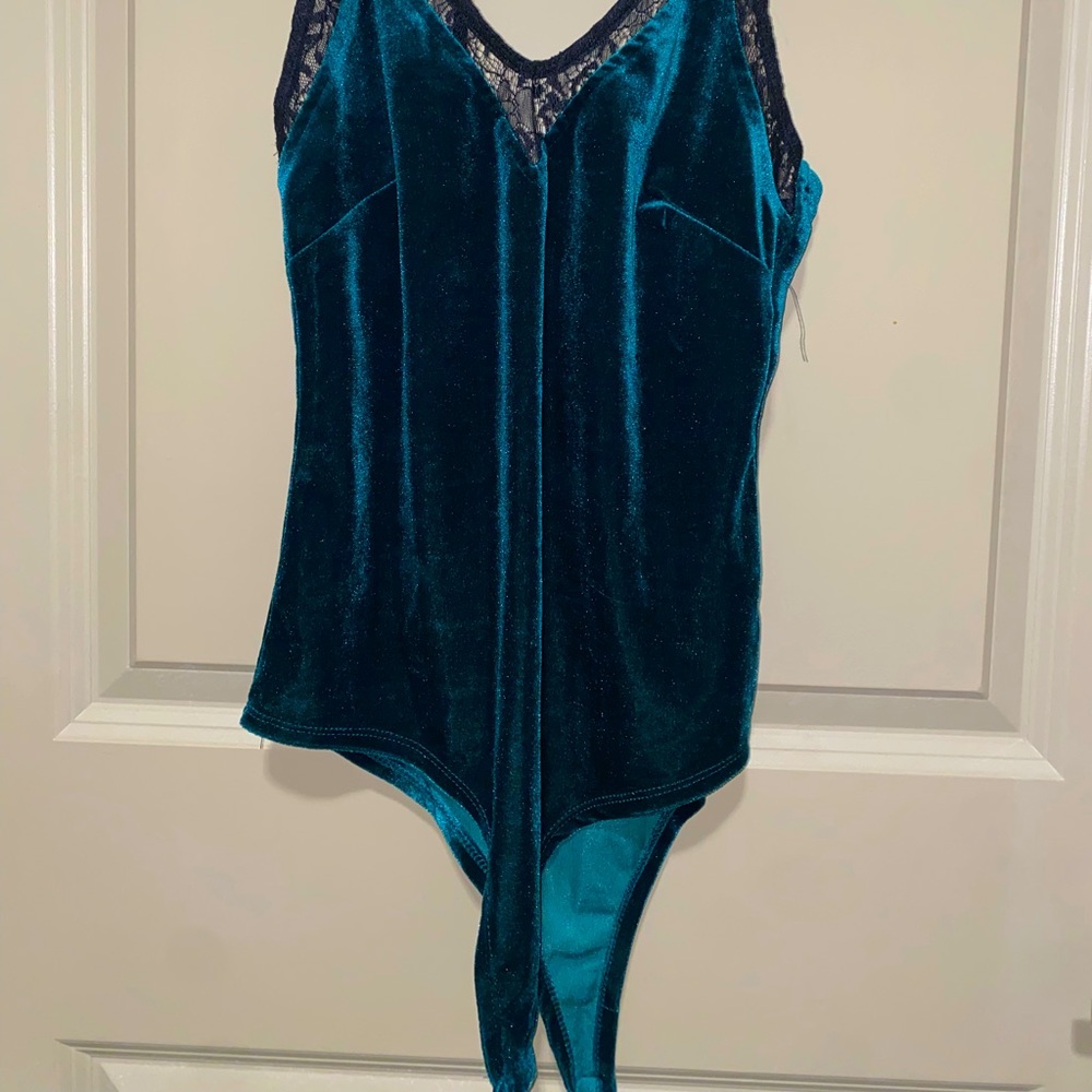 Wet Seal. size M. Body suit. Suede. black Lace